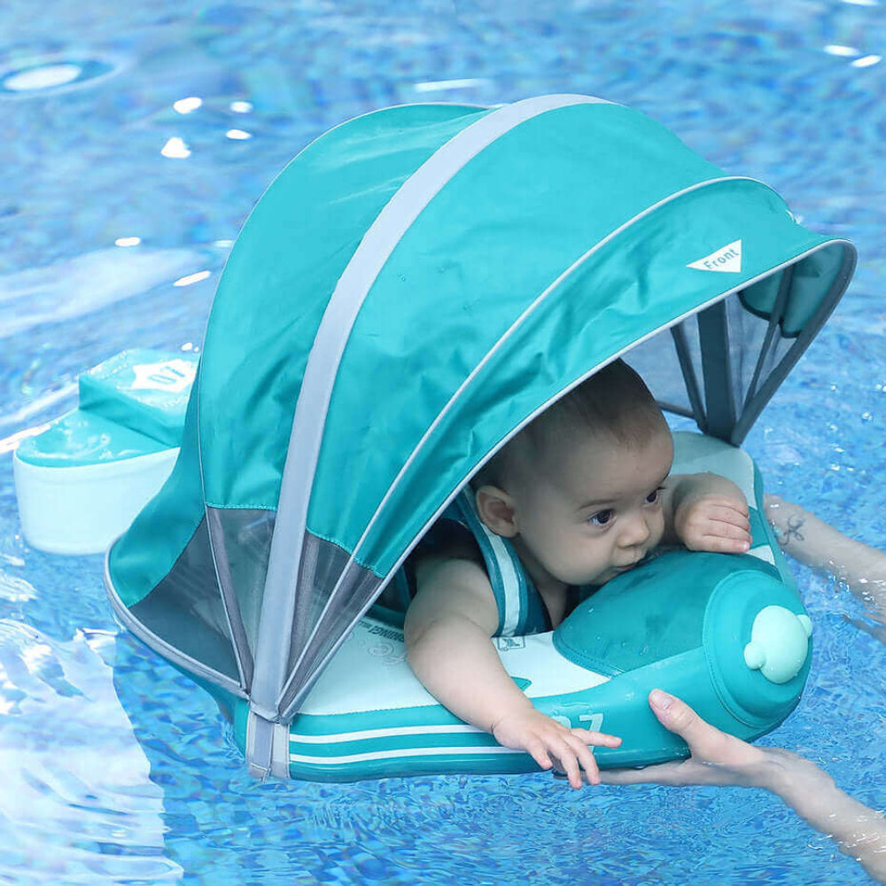 Flotador bebé sin aire Mambobaby™ Avión Explorador – Asiento flotador con toldo azul verdoso, arnés y almohadilla para el...